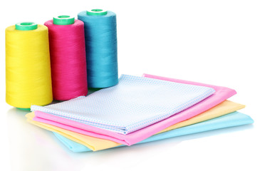 Sewing accessories and fabric isolated on white