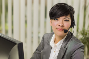 Attractive Young Mixed Race Woman Smiles Wearing Headset