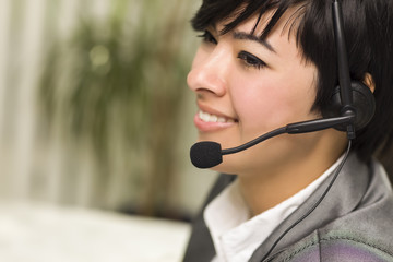 Attractive Young Mixed Race Woman Smiles Wearing Headset