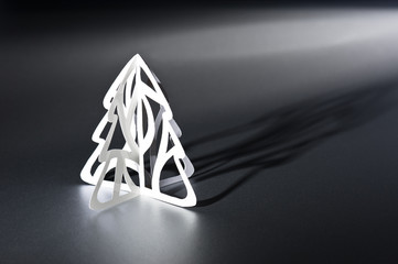 Paper cut Christmas tree in black and white