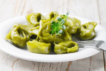 Italian healthy  food - Green spinach tortellini