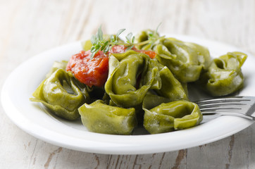 Italian healthy  food - Green spinach tortellini