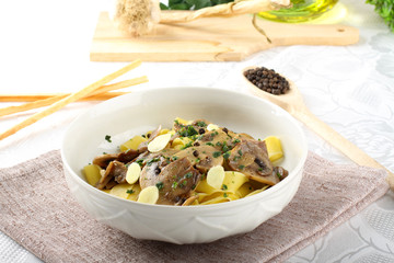 Noodles with mushrooms and parsley