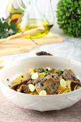 Noodles with mushrooms and parsley