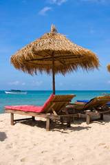 Sun loungers with an umbrella