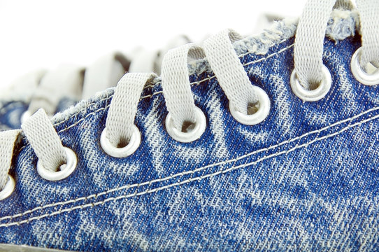 old jean canvas shoes  on the background
