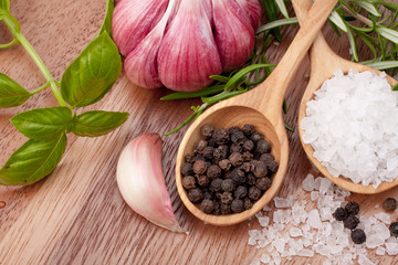 Fresh herbs and salt spoon