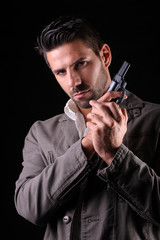 gangster or private detective with a pistol
