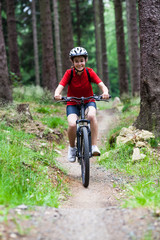 Fototapeta premium Girl biking