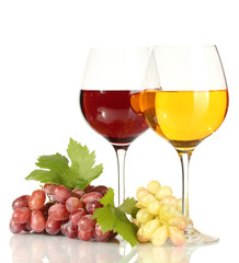 glasses of wine and ripe grapes isolated on white