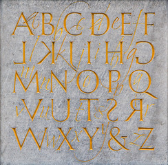 Stone background with alphabet