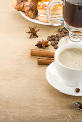 cup of coffee and beans as background