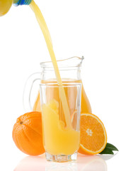 orange juice in glass and jug isolated on white background