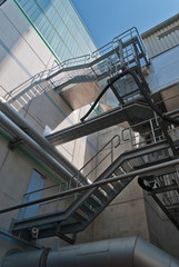 Naklejka premium Fire escape stairs on wall of building
