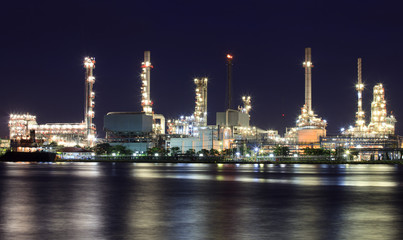 Obraz na płótnie Canvas Landscape of river and oil refinery factory