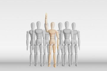 Wooden model in the crowd for human resource and question concep
