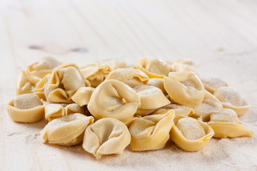 Making homemade tortellini