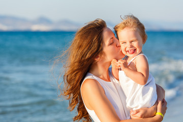 Mother and daughter on the beach