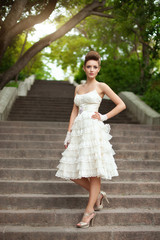 very beautiful brunette in a wedding dress.