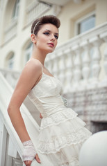 Fototapeta na wymiar very beautiful brunette in a wedding dress.