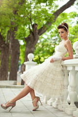 very beautiful brunette in a wedding dress.