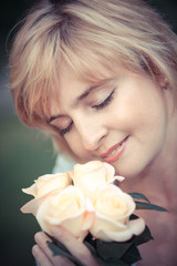 Happy smiling woman with flower