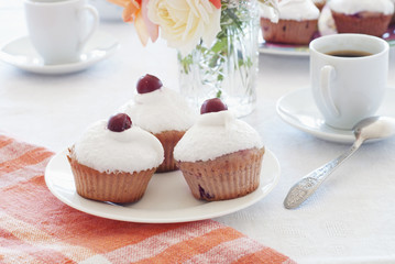 Breakfast: cherry muffins with coffee