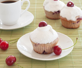 Breakfast: cherry muffins with coffee