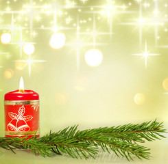 Christmas candle and holly background concept