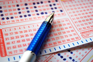 Lucky lottery ticket with pen