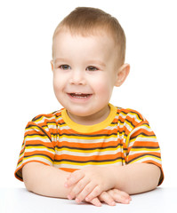 Portrait of a cute cheerful little boy