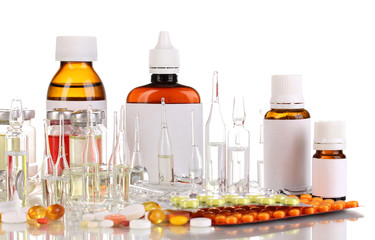 Medical bottles with medical ampoules and tablets isolated