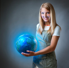 Girl holding the Planet  Earth. Future Concept