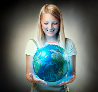 Girl holding the Planet  Earth. Future Concept