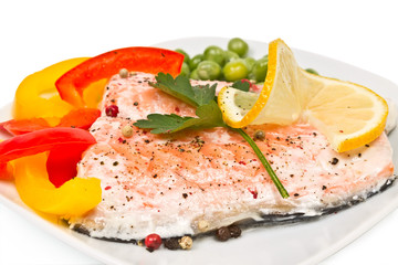 fillet of salmon with vegetables and peas