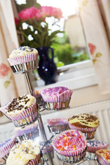 Variety of decorated cupcakes. Close-up