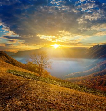 sunrise above a mountain valley © Yuriy Kulik