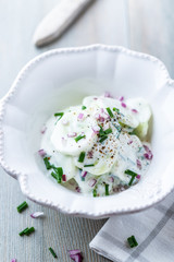Cucumber with yogurt, chive and onion