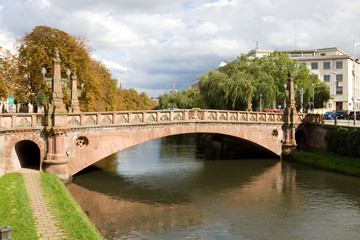 Beautiful cityscape in Strasbourg with a bridge over Ill river