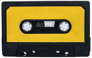 Yellow vintage retro cassete tape isolated on white