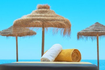 Towels for the spa, on the background of the Portuguese sea.