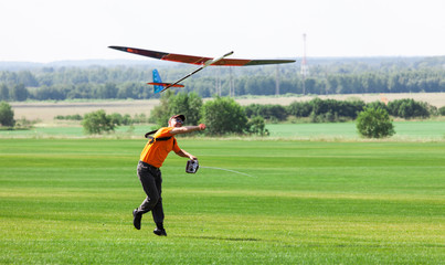 Man launches into the sky RC glider