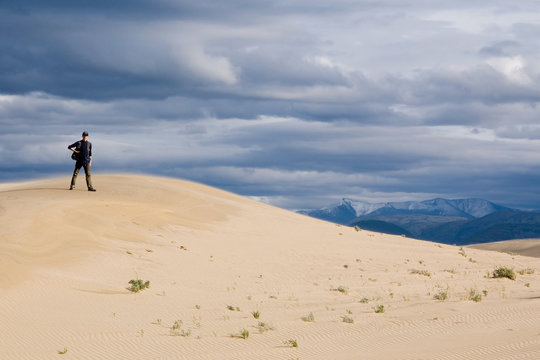 Desert landscape with traveler in Chara, Siberia