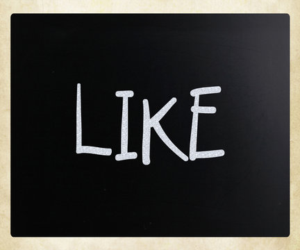 "Like" handwritten with white chalk on a blackboard