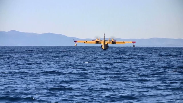 Fire fighter airplane landing at sea