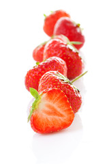 Row of fresh strawberries in closeup