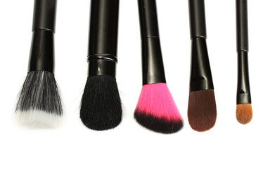 Fototapeta premium black brushes for make-up isolated on white.