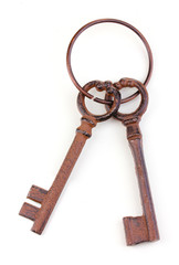 a bunch of antique keys isolated on white