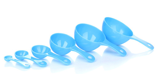 Blue measuring spoons isolated on white