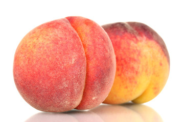 ripe peaches isolated on white.